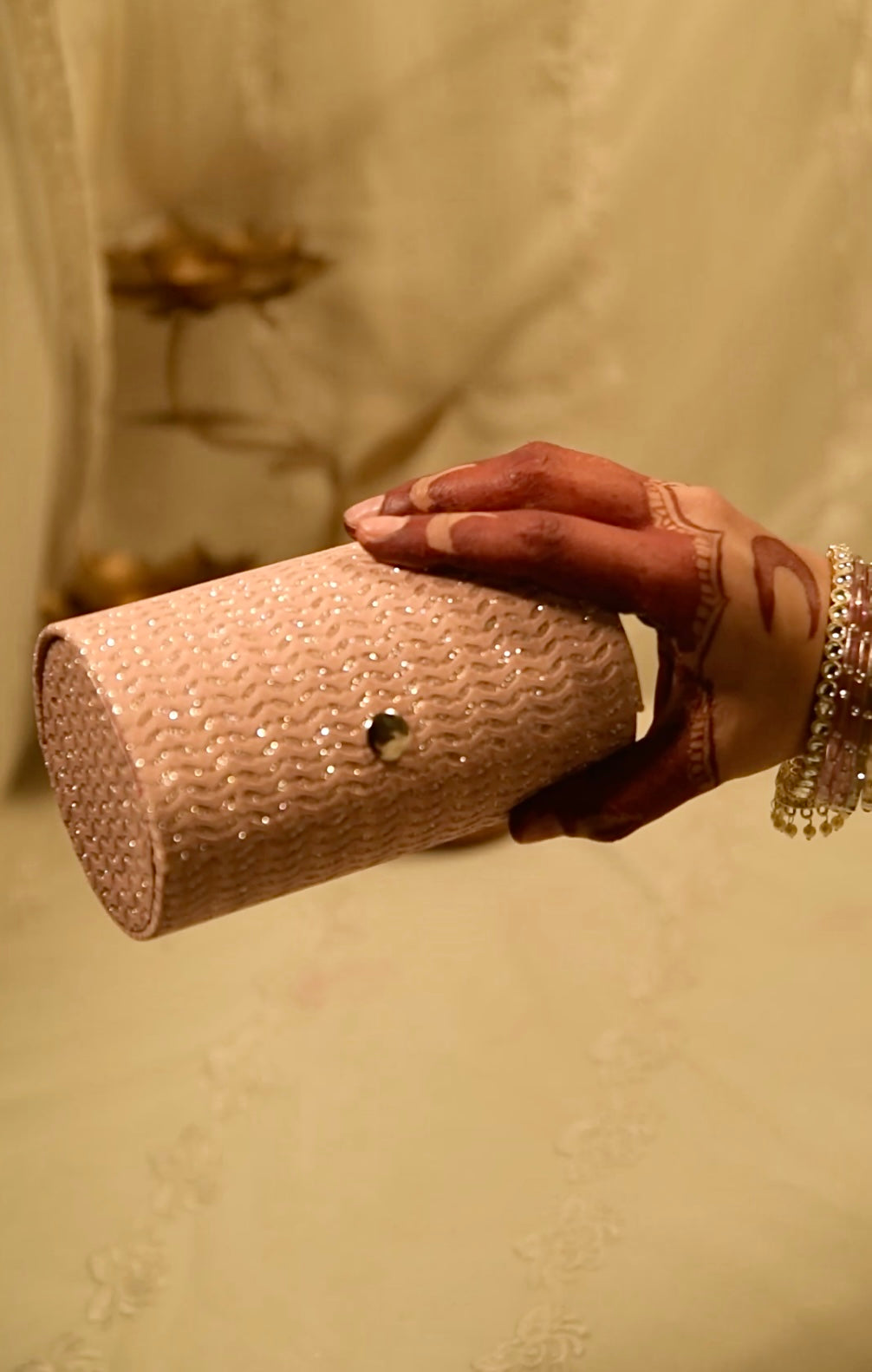 BANGLE CLUTCH